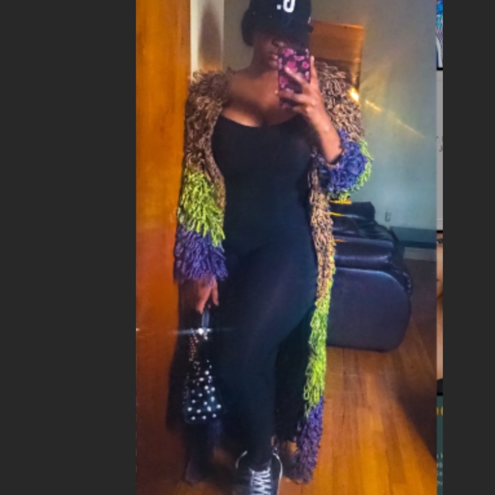 Body length fringe jacket